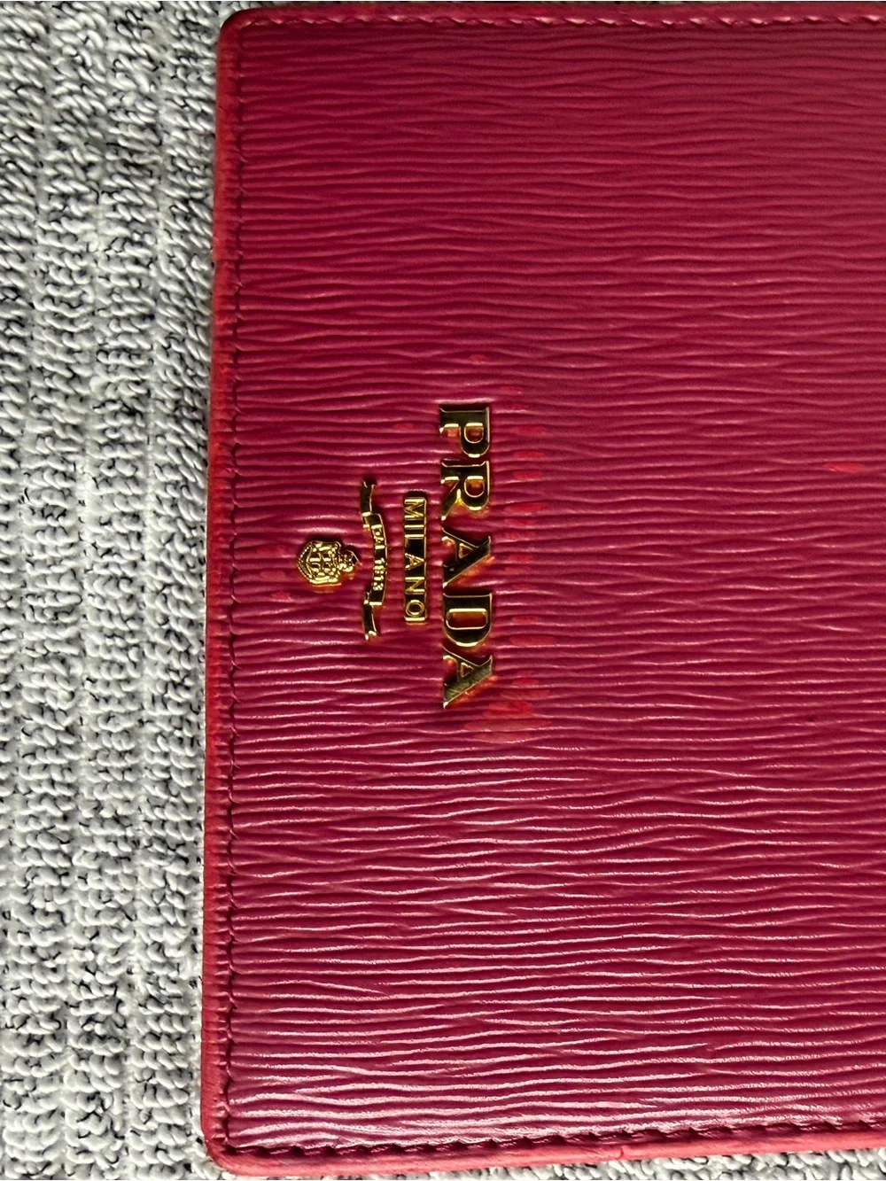 Authentic Prada Saffiano Leather Compact Wallet in deep red/berry/magenta color